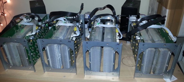 Our four antminer S1's mining away. Doubles as space heater, and also nightime heat mat for our pair of bearded dragons