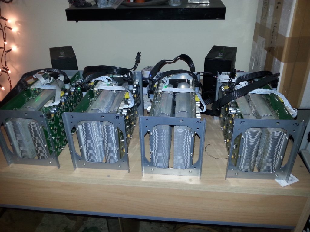 Our four antminer S1's mining away. Doubles as space heater, and also nightime heat mat for our pair of bearded dragons