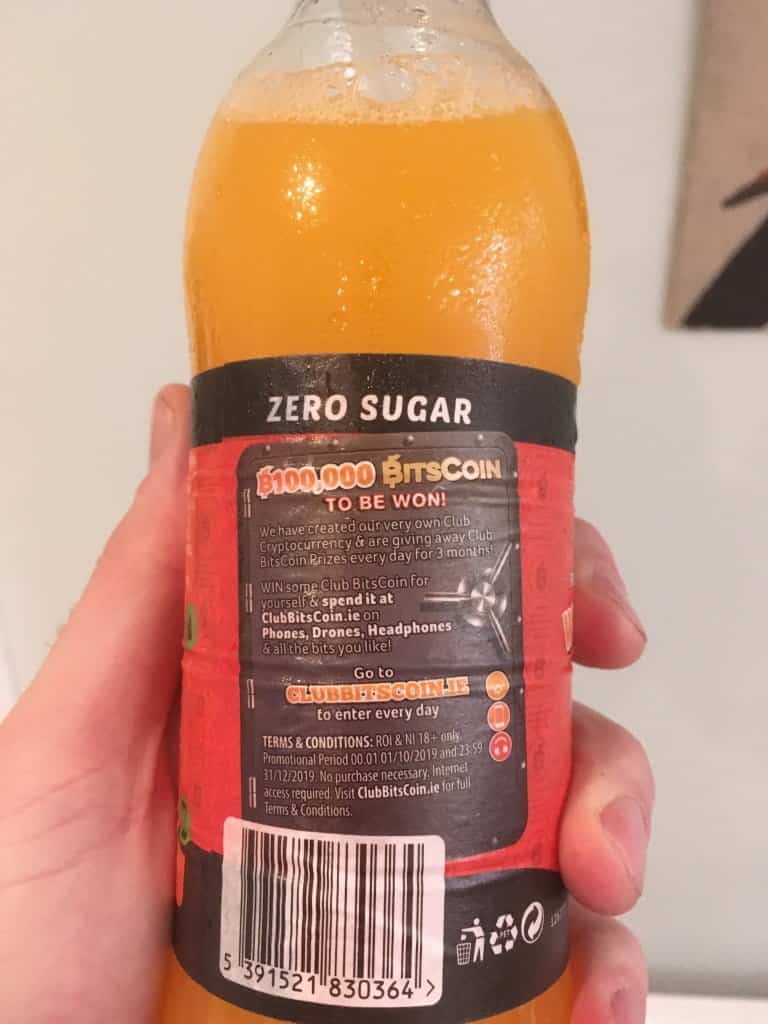 Back of the Club Orange Bottle with Club Bitscoin Promotion